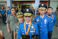Walikota Tangerang Menghadiri Peringatan HUT Damkar, Satpol PP dan Satlinmas di Palembang 